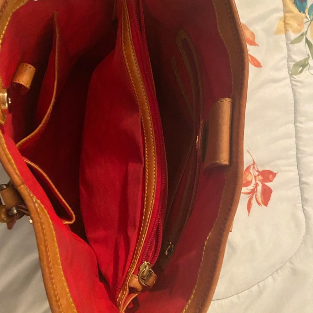 MK yellow purse. Dooney and Burke blue purse.